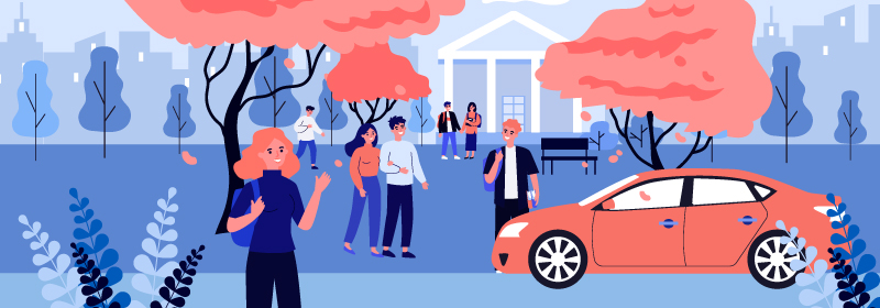 College students next to a car.