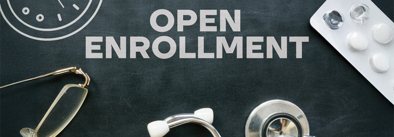 College students next to a car.