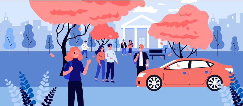 College students next to a car.